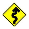 Road sign to warn for curves.